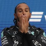 'He was fighting against an outside force': Lewis Hamilton had 'one hand tied behind his back' by F1 race director Michael Masi during his controversial title defeat by Max Verstappen, claims former Red Bull driver Mark Webber