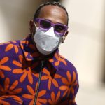 Fans love Lewis Hamilton’s ‘flower power’ dressing gown outfit as icon sends message ahead of Bahrain F1 opener