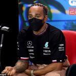Lewis Hamilton admits he was 'uncomfortable' after F1 chiefs chose not to wear face masks at an Australian Grand Prix briefing... as he says he was left baffled by officials telling drivers to wear fireproof underwear