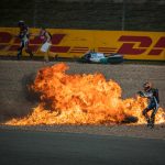 Horror mass Moto2 crash sees bike burst into fireball as riders run away from blaze with debris scattered all over track