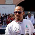 Lewis Hamilton avoids punishment for wearing jewellery and will be allowed to keep his nose stud in at Monaco... but his row with the FIA could resurface if he has not removed it by Silverstone in July