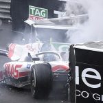 Mick Schumacher's Haas splits in TWO after a high-speed crash into a barrier at the rain-disrupted Monaco Grand Prix, leading to a red flag... but the driver manages to walk away unscathed from the alarming incident