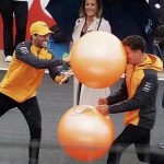 Daniel Ricciardo hits Lando Norris in the face with a space hopper as McLaren drivers take each other on in hilarious race at Silverstone