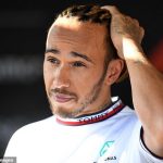 'It's KILLING me': Lewis Hamilton gives Mercedes an injury scare as he climbs out his car holding his back after finishing fourth in Baku to make him a doubt for the Canadian Grand Prix next week, with bouncing Mercedes causing the Brit pain