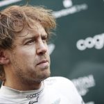 Vettel goes quiet after dropping climate helmet