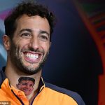 Daniel Ricciardo arrives at Monza with a 'ridiculous' tattoo of Lando Norris' face on his neck... as the Australian appears to put to bed rumours of a rift with his team-mate following his McLaren axing