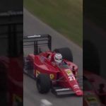 Nigel Mansell's V12 Ferrari screams up Goodwood Hill