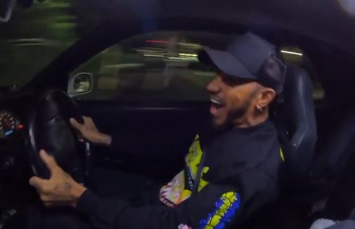 Formula 1 star Lewis Hamilton slammed for doing doughnuts in a £155,000 Nissan Skyline supercar in a Japanese car park