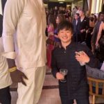 fans in hysterics after 5ft 3in driver Yuki Tsunoda poses alongside ex-basketball star… who is TWO FEET taller